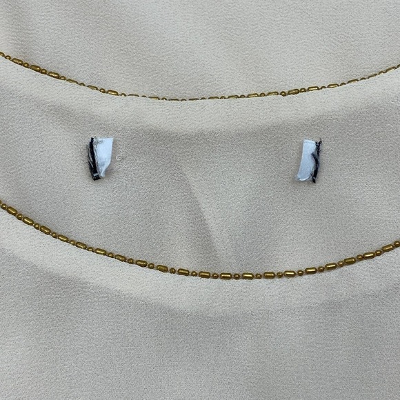 NAKED Zebra Beige Sleeveless Ruffle-Back Blouse - Picture 9 of 12